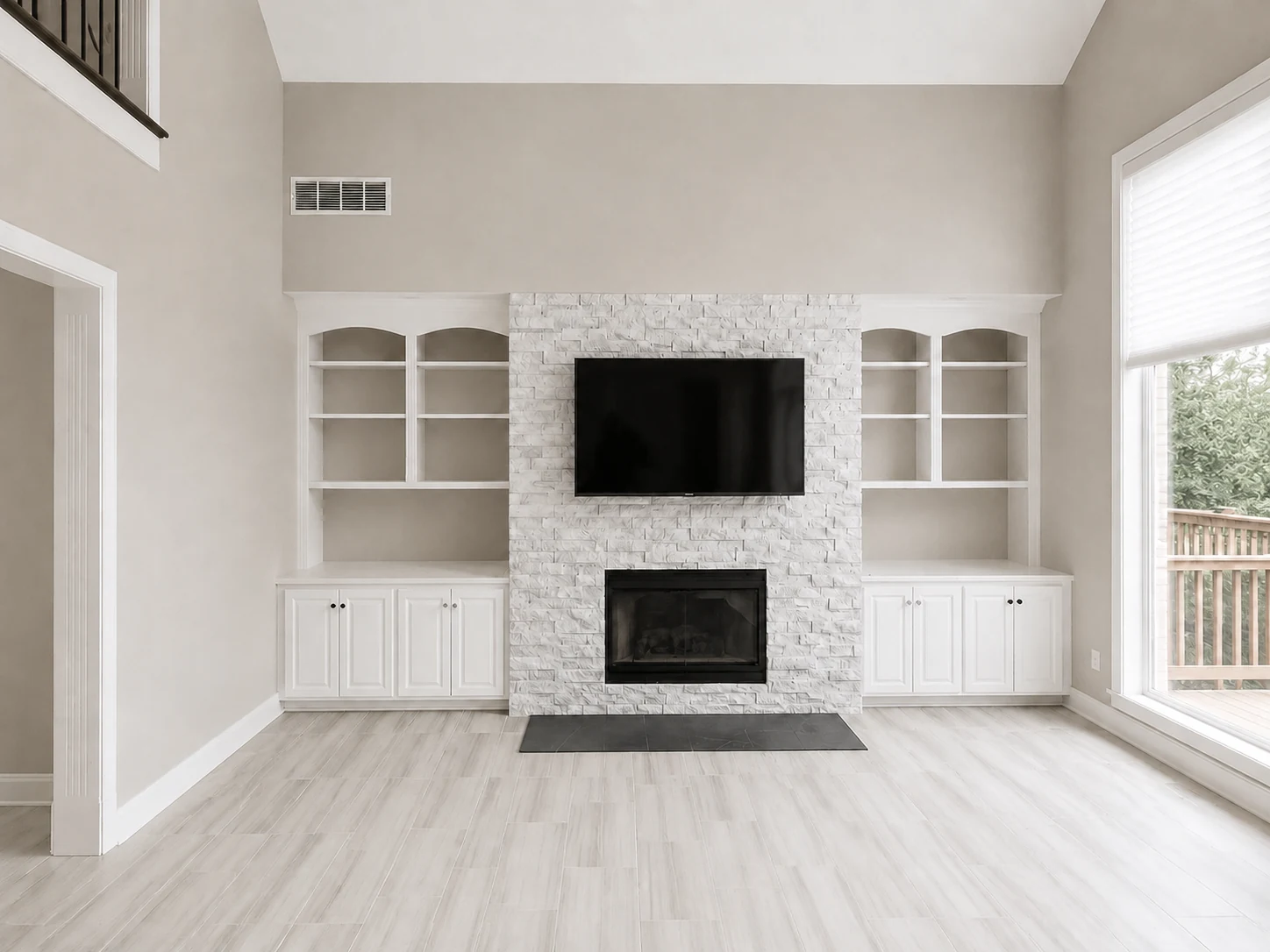 Completed fireplace and custom built-in remodeling project by AJC General Contracting